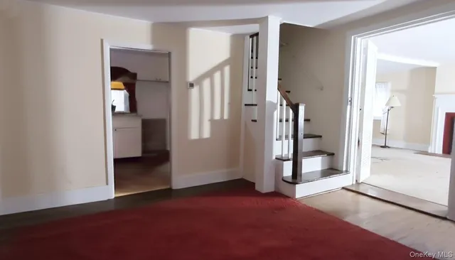 a kitchen with a sink and a refrigerator