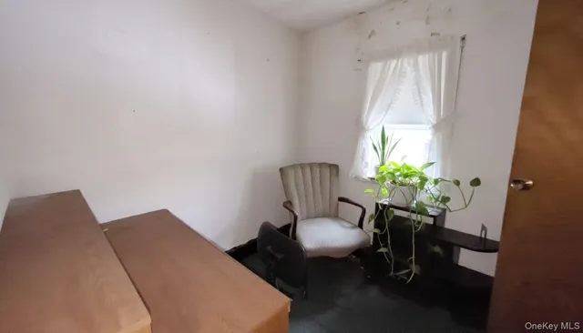 a bathroom with a shower and a sink