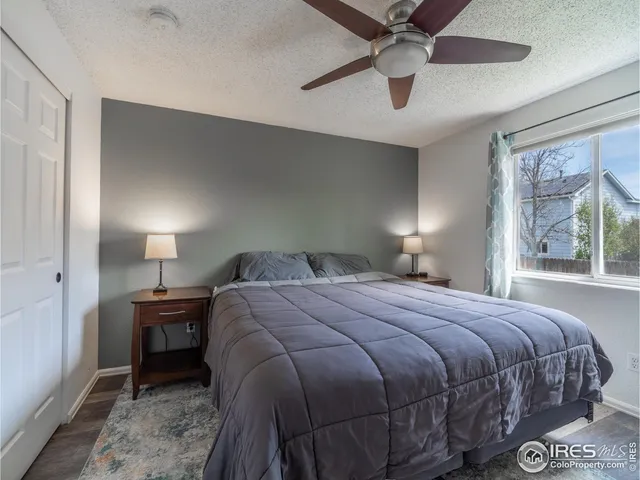a bedroom with a bed and a walk in closet