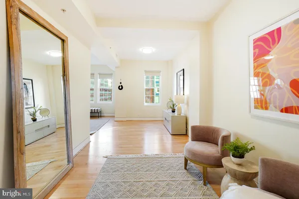 a living room with furniture and a area