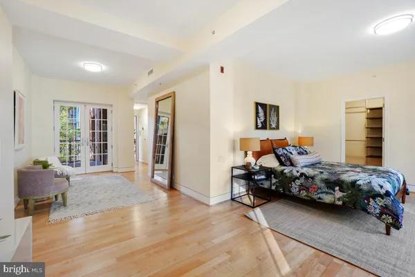 a bed room with furniture and a window