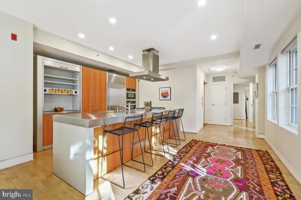 a very nice looking dining room with a large window