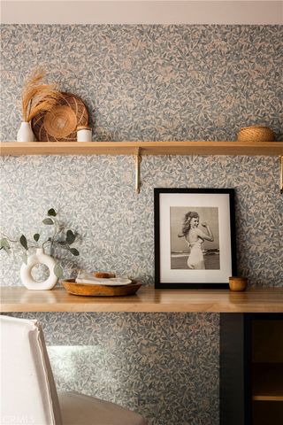 a spacious bedroom with a bed and a couch