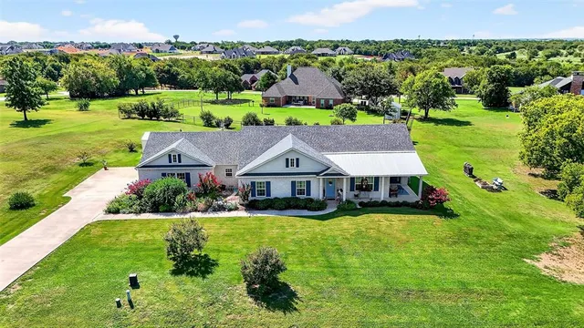 a view of a garden with an outdoor space