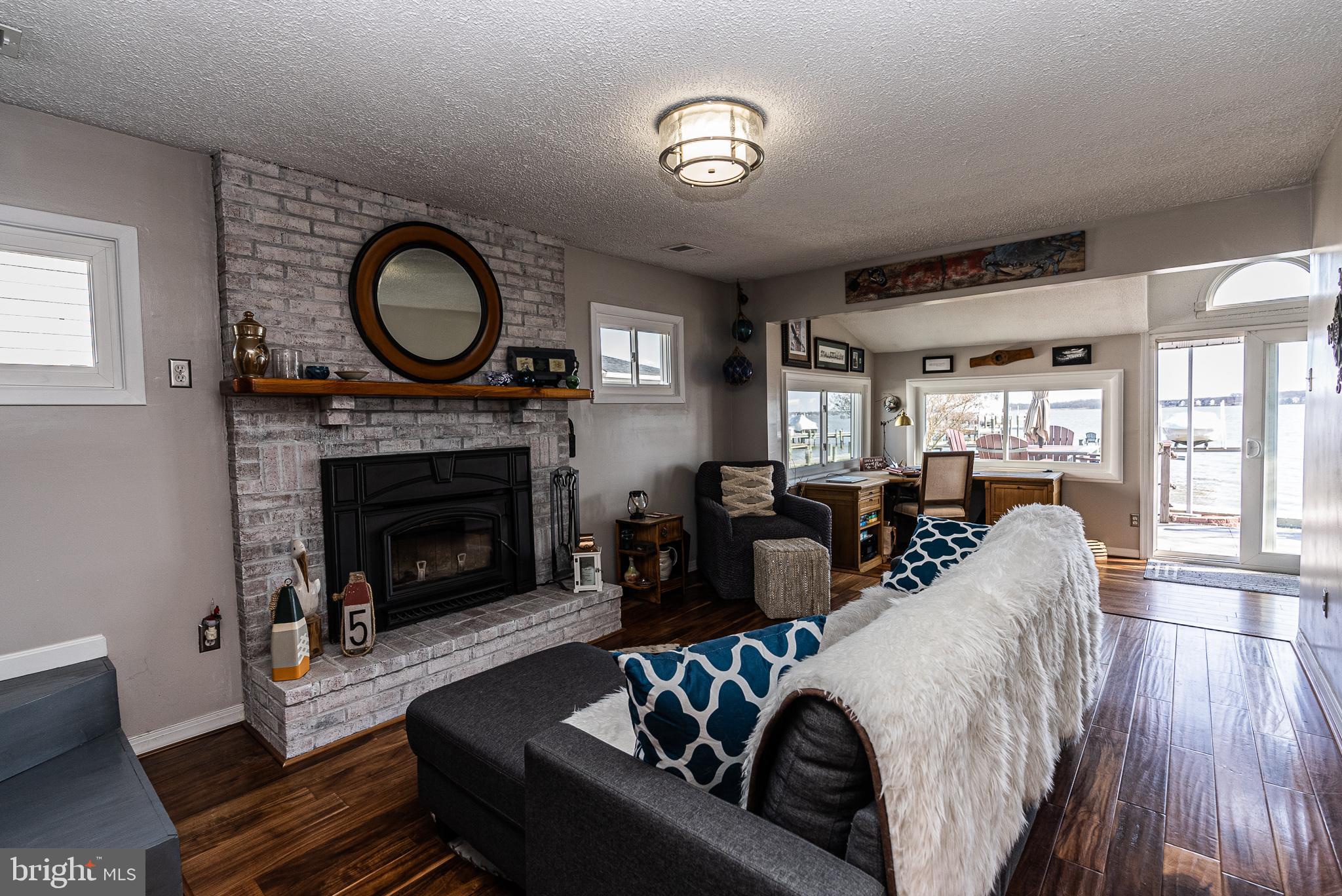 1227 Bayside Road Essex, MD 21221 - Photo 16 of 78 Cozy living room with water view