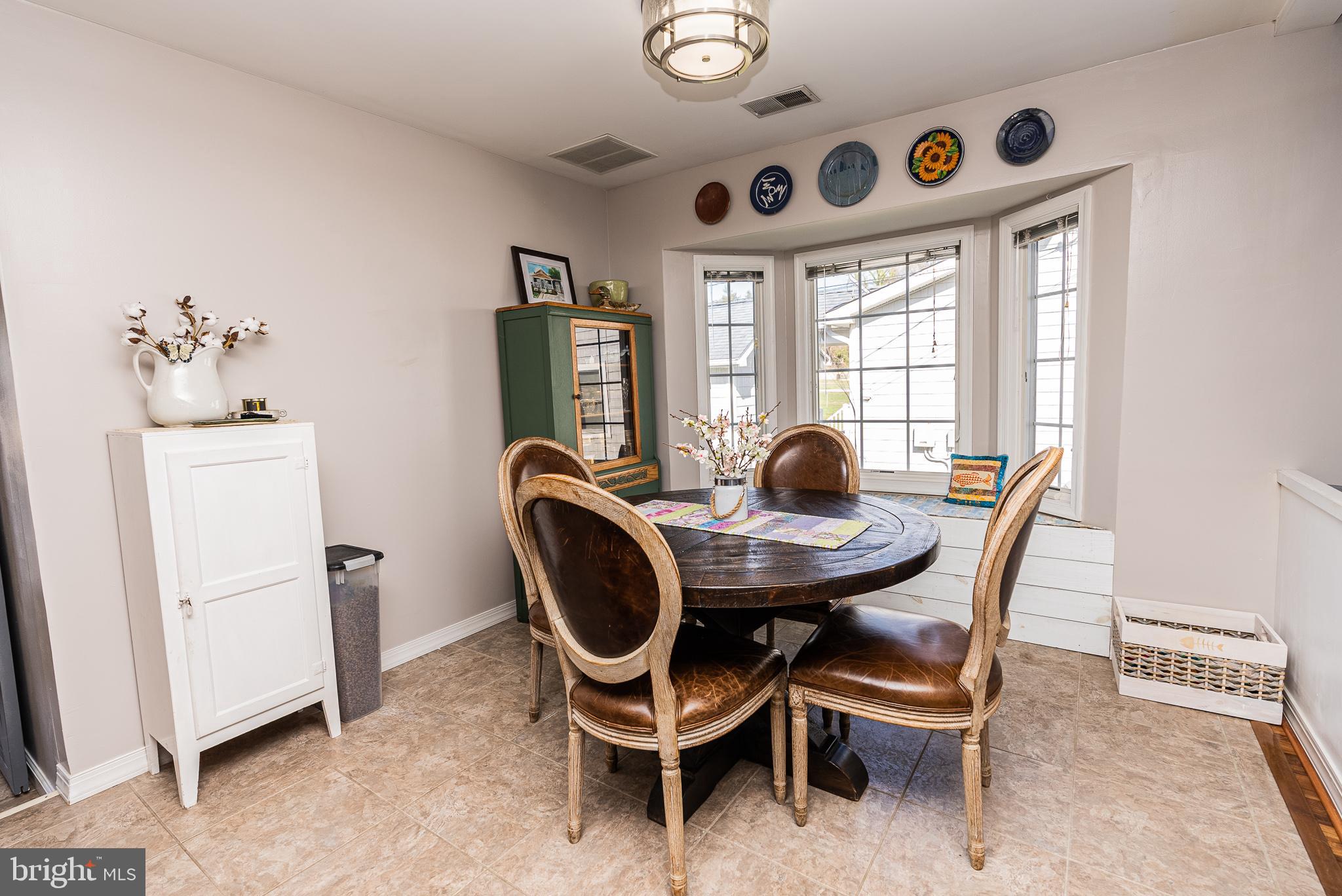 1227 Bayside Road Essex, MD 21221 - Photo 8 of 78 Dining area with bench seat