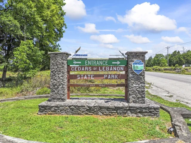 a sign on the side of the road