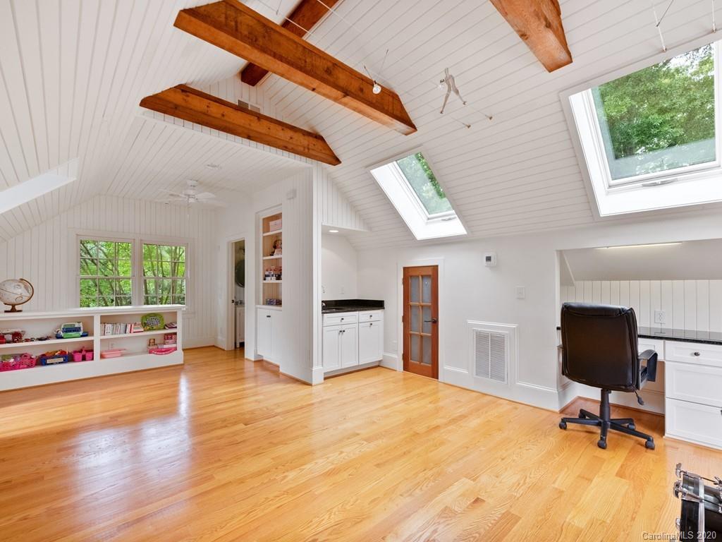 2440 Overhill Road Charlotte, NC 28211 - Photo 40 of 48 a very nice looking room with a large window