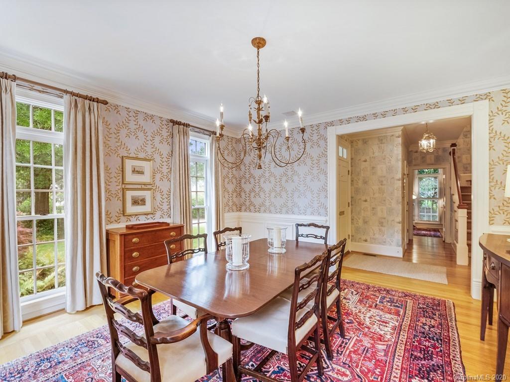 2440 Overhill Road Charlotte, NC 28211 - Photo 7 of 48 a view of a dining room with furniture window and wooden floor