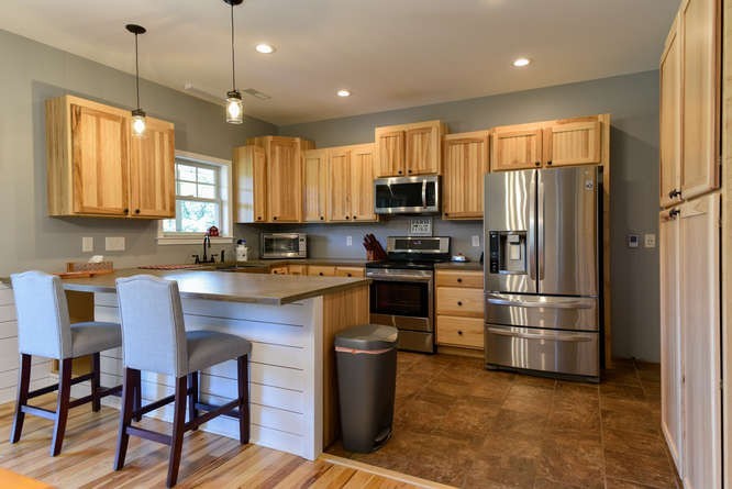 1754 Vesta Road Lebanon, TN 37090 - Photo 1 of 37 a kitchen with kitchen island granite countertop a stove a refrigerator and a sink