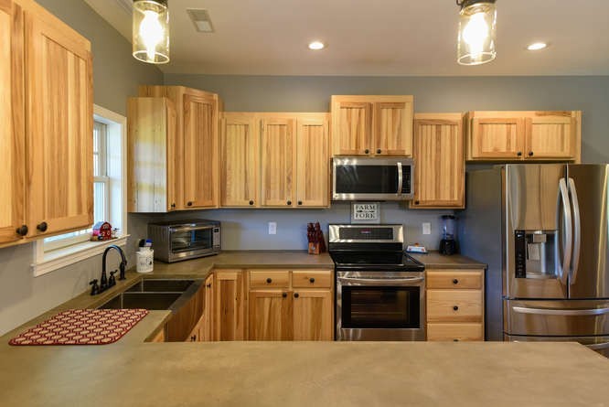 1754 Vesta Road Lebanon, TN 37090 - Photo 11 of 37 a kitchen that has a sink cabinets and stainless steel appliances
