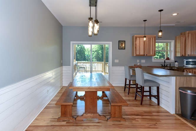 1754 Vesta Road Lebanon, TN 37090 - Photo 13 of 37 a view of a dining room with furniture a chandelier and wooden floor