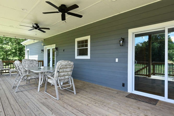 1754 Vesta Road Lebanon, TN 37090 - Photo 20 of 37 a dining space with wooden floor and outdoor space