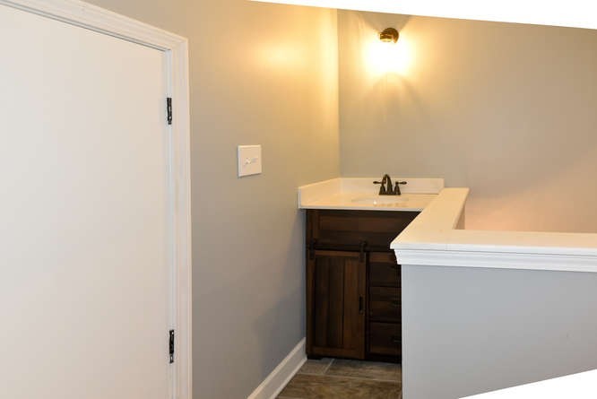 1754 Vesta Road Lebanon, TN 37090 - Photo 30 of 37 a bathroom with a sink and a mirror