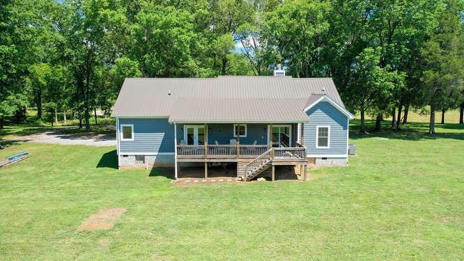 1754 Vesta Road Lebanon, TN 37090 - Photo 31 of 37 a front view of a house with a garden and deck