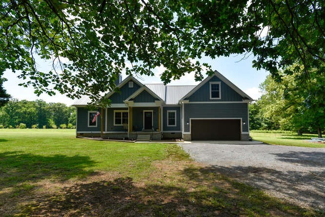 1754 Vesta Road Lebanon, TN 37090 - Photo 5 of 37 a front view of a house with yard and green space