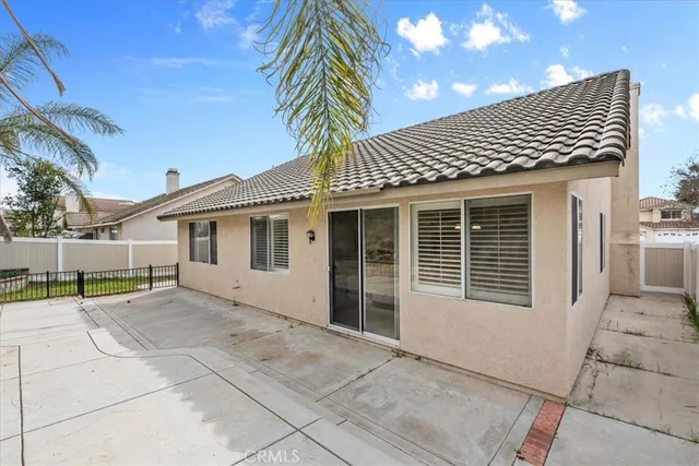 an aerial view of residential houses with outdoor space and river