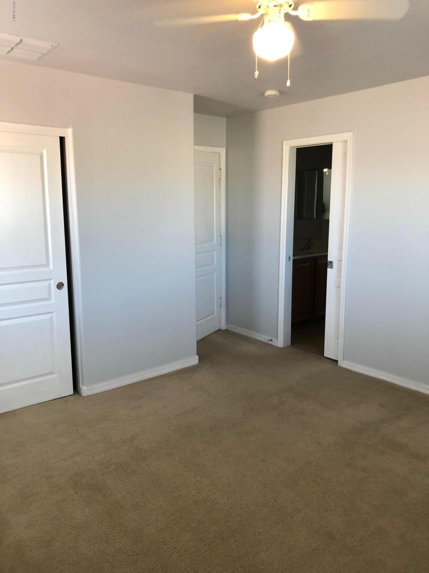 16741 West Tether Trail Surprise, AZ 85387 - Photo 13 of 20 an empty room with a bathroom