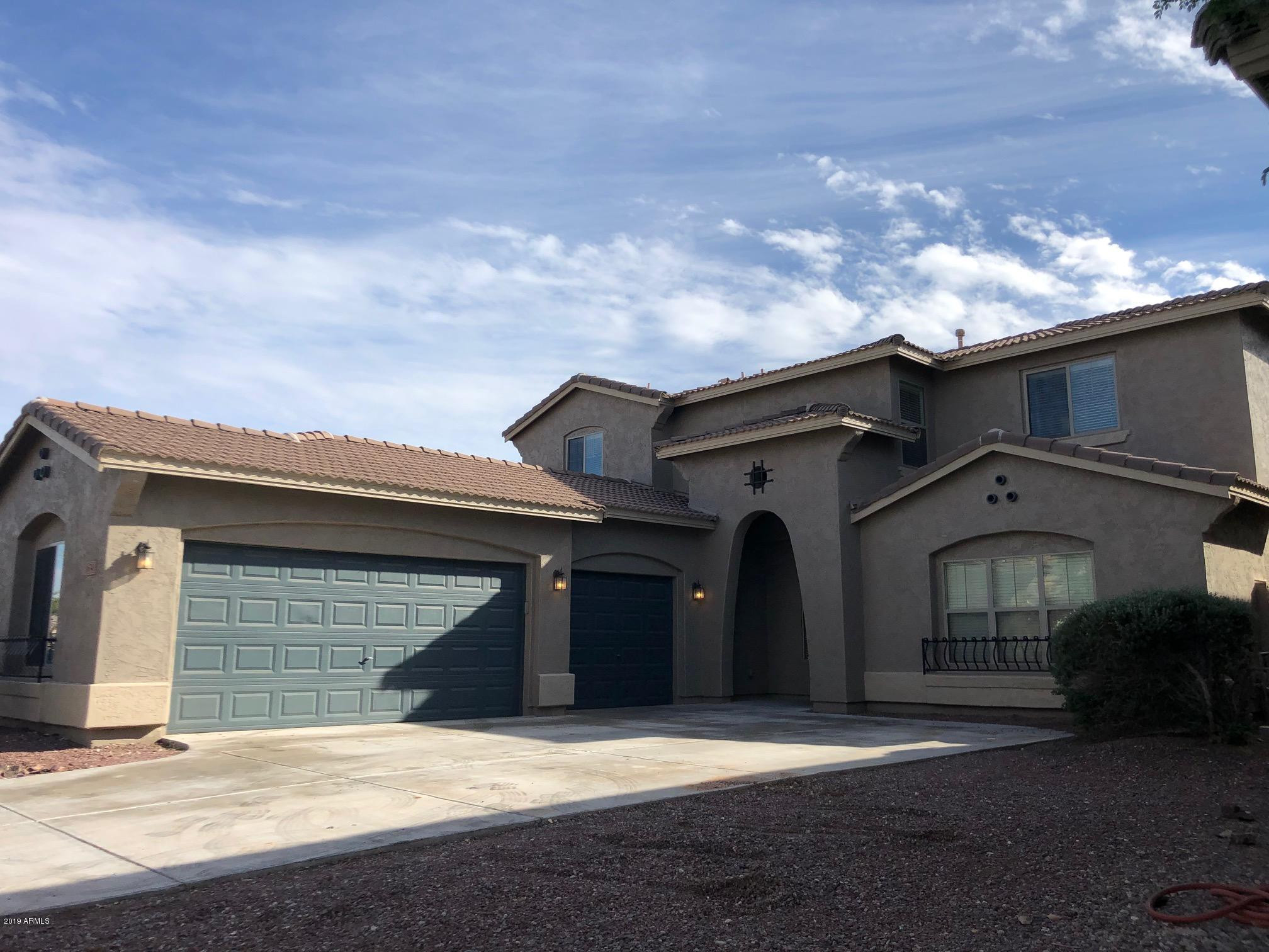 16741 West Tether Trail Surprise, AZ 85387 - Photo 3 of 20 a front view of a house