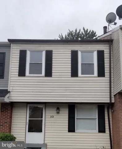 a view of a house with many windows