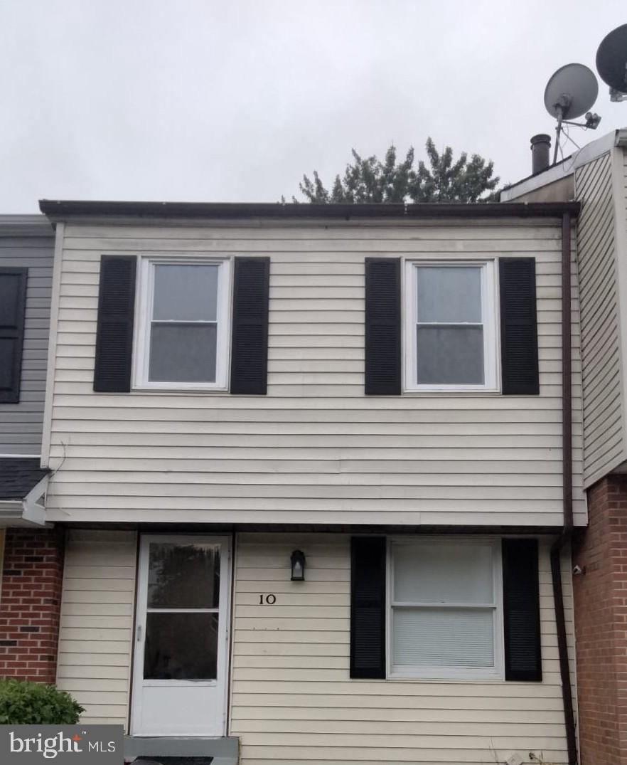 a view of a house with many windows