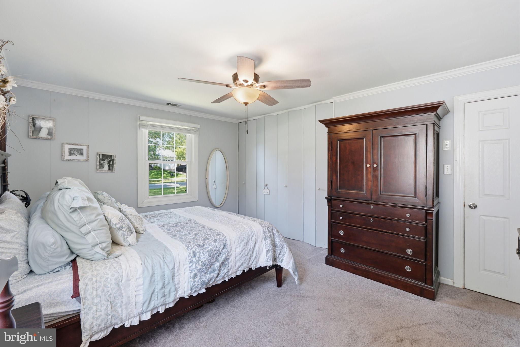 19608 Gott Street Poolesville, MD 20837 - Photo 26 of 43 a bedroom with a bed and a dresser
