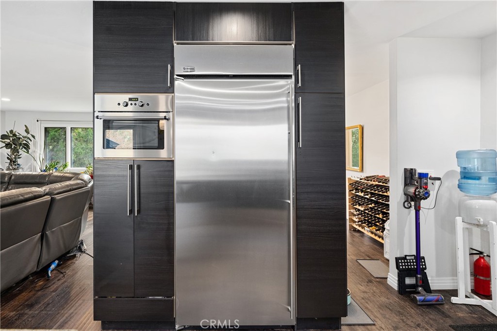 2631 Big Wagon Road Alpine, CA 91901 - Photo 20 of 49 a kitchen with metallic refrigerator and a stove