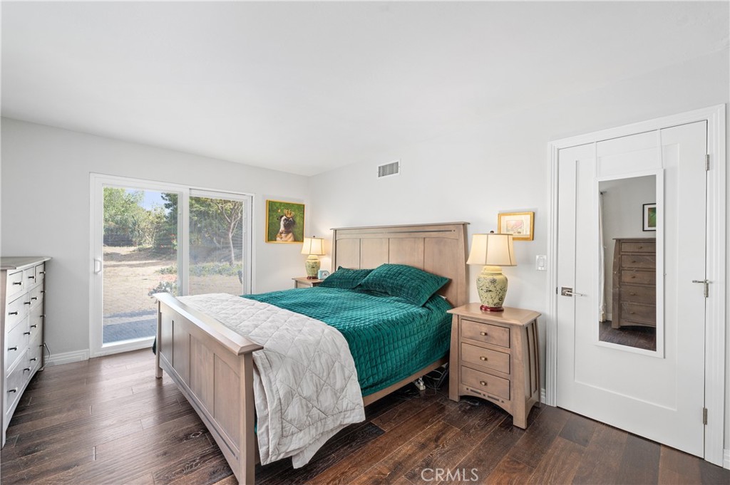 2631 Big Wagon Road Alpine, CA 91901 - Photo 32 of 49 a bedroom with a large bed and a closet