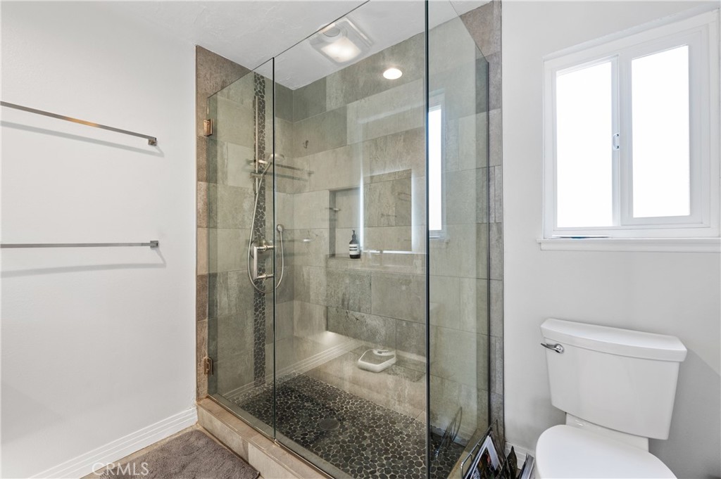 2631 Big Wagon Road Alpine, CA 91901 - Photo 35 of 49 a bathroom with a shower a toilet and a sink