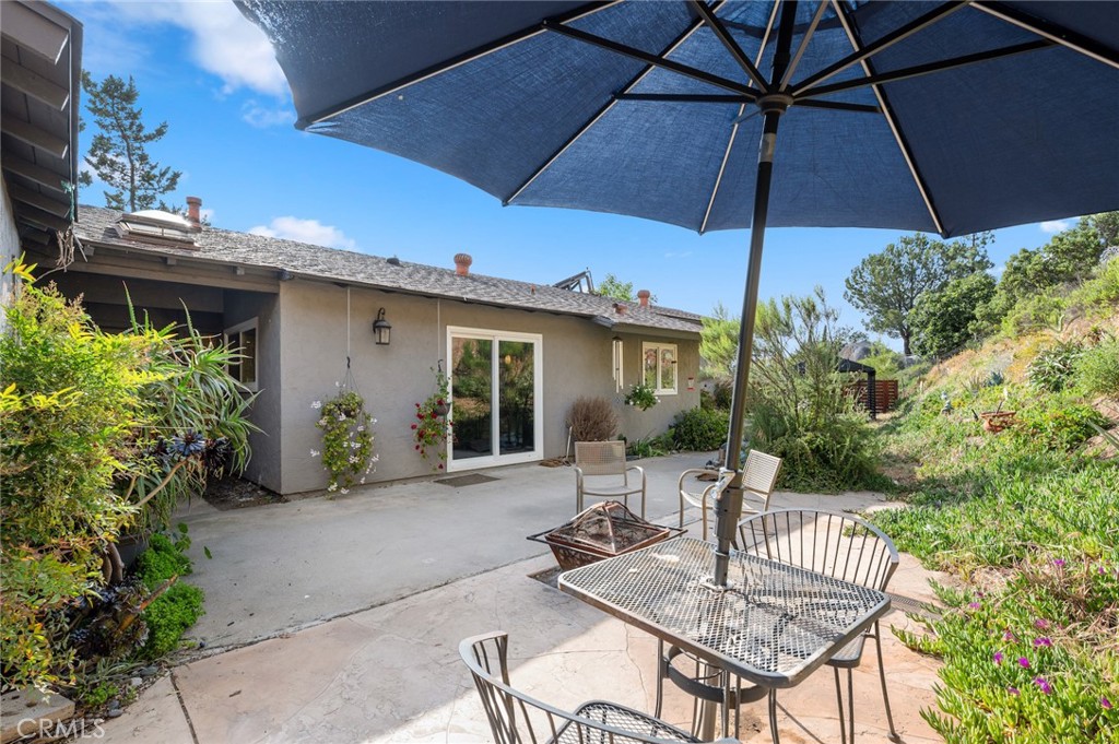 2631 Big Wagon Road Alpine, CA 91901 - Photo 39 of 49 a patio with a patio table and chairs