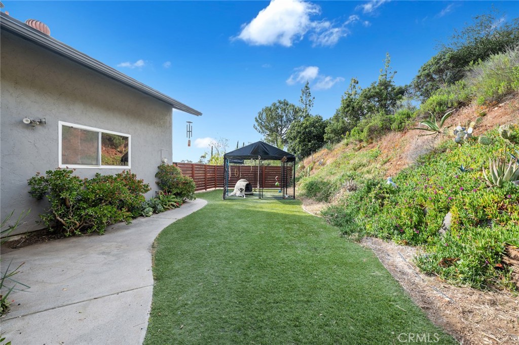 2631 Big Wagon Road Alpine, CA 91901 - Photo 41 of 49 a front view of a house with a yard