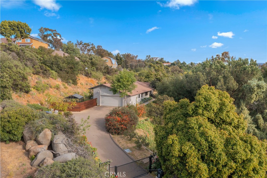 2631 Big Wagon Road Alpine, CA 91901 - Photo 6 of 49 a view of a houses with a yard