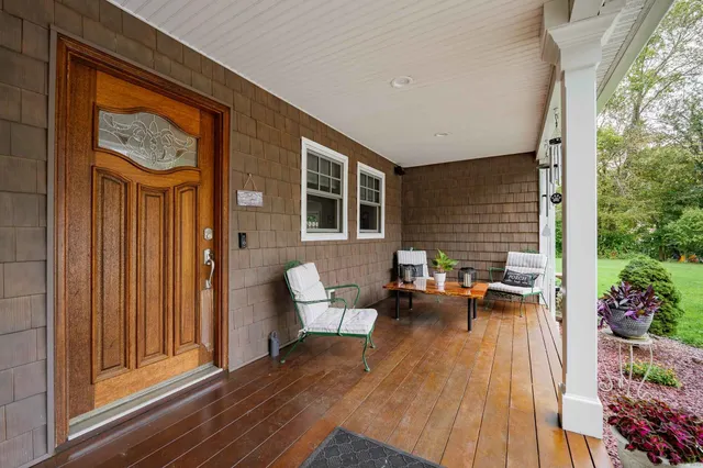 a view of a house with sitting area