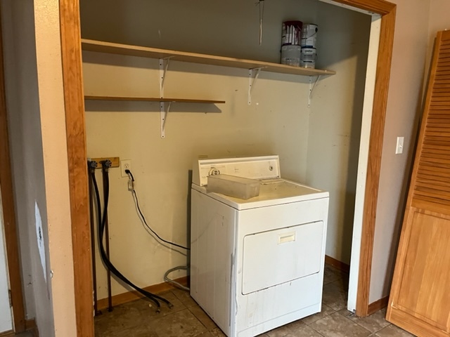6081 South Woodlawn Road Rochelle, IL 61068 - Photo 4 of 8 a utility room with dryer and washer