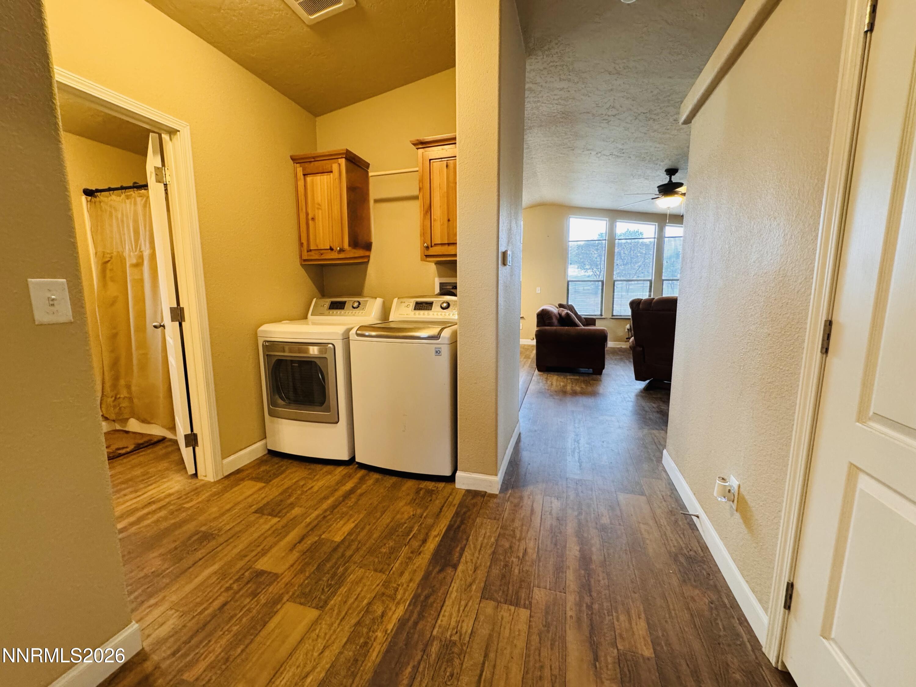 29400 Kings River Road Orovada, NV 89425 - Photo 19 of 40 a view of a bedroom with wooden floor and furniture