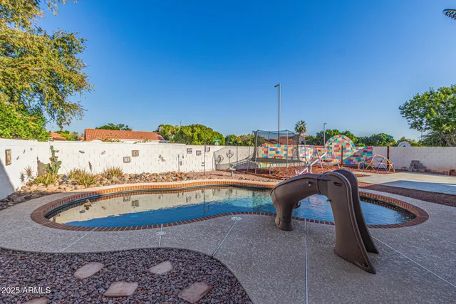 a view of a chairs and table on the terrace