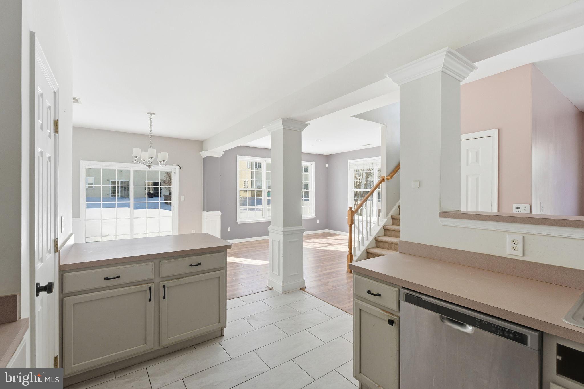 187 Gillespie Avenue Middletown, DE 19709 - Photo 13 of 43 a kitchen with white cabinets and sink