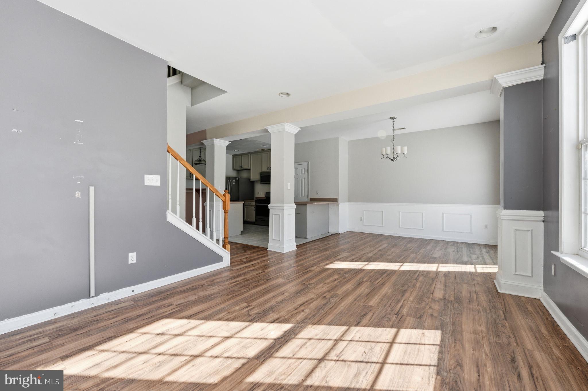 187 Gillespie Avenue Middletown, DE 19709 - Photo 17 of 43 a view of an empty room with wooden floor