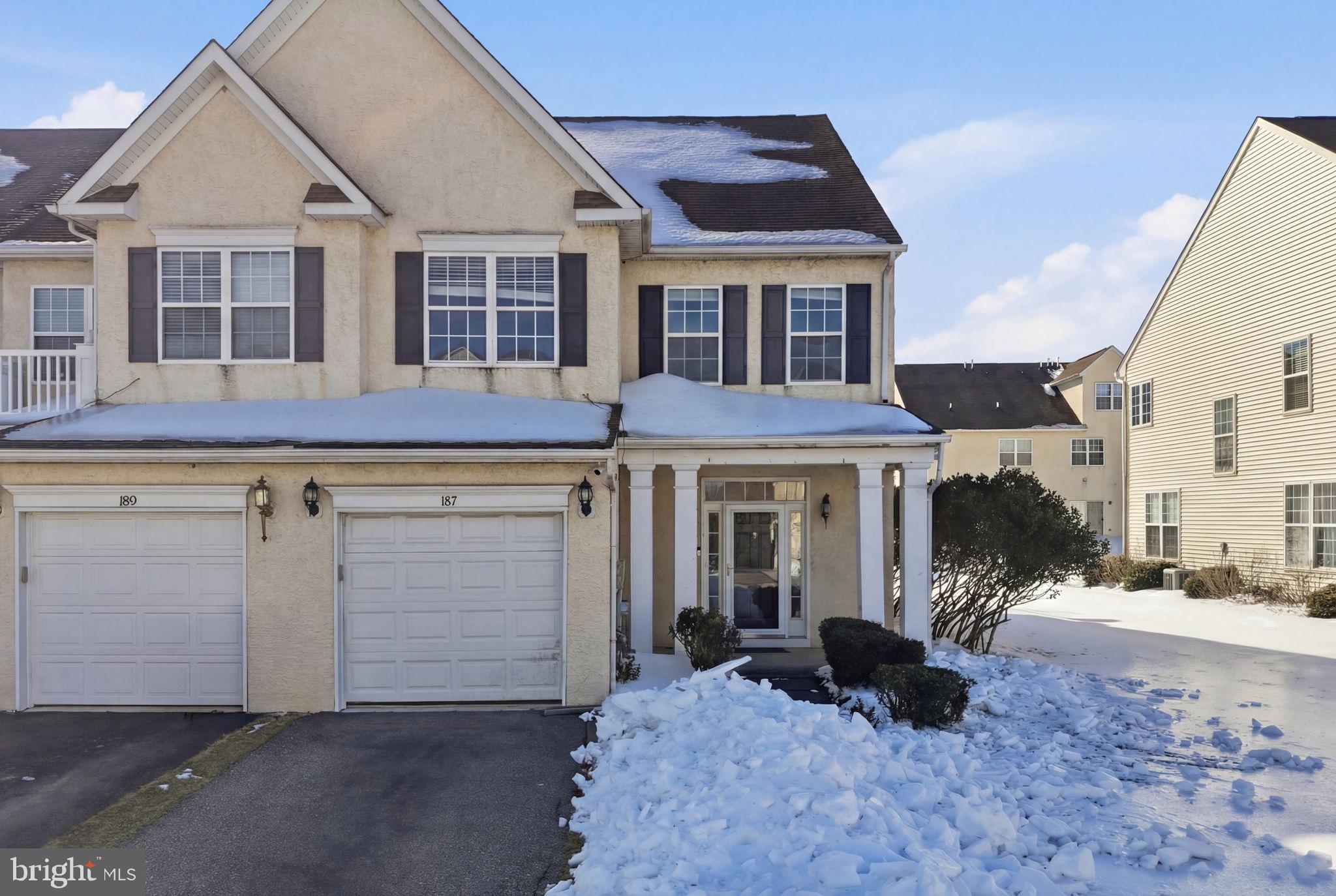 187 Gillespie Avenue Middletown, DE 19709 - Photo 2 of 43 a front view of a house with a yard and garage