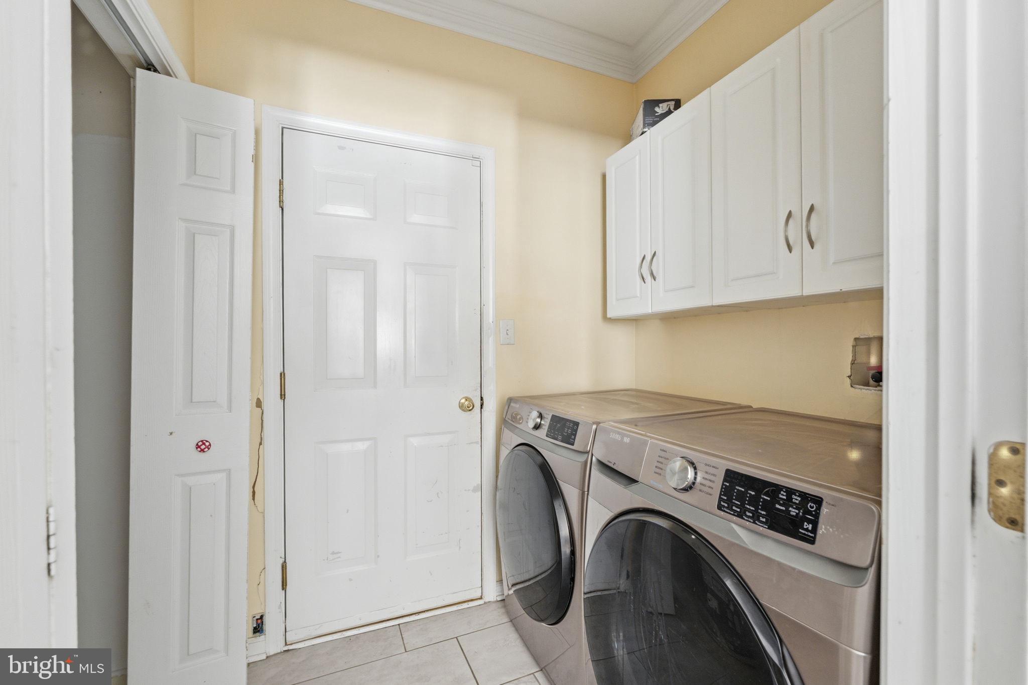 187 Gillespie Avenue Middletown, DE 19709 - Photo 21 of 43 a view of storage and utility room with washer and dryer