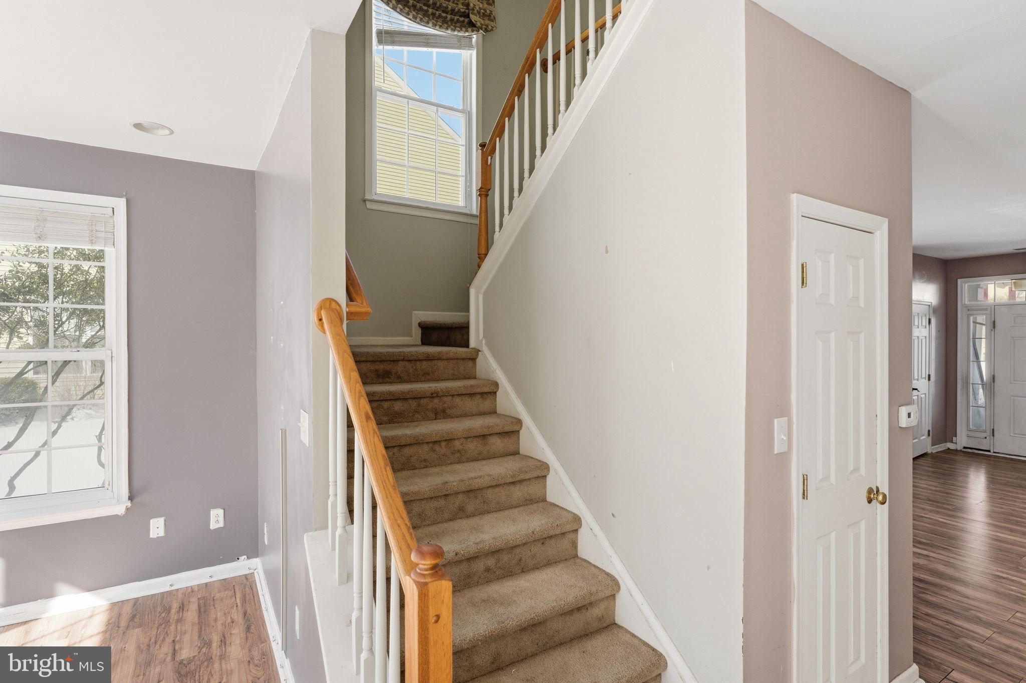 187 Gillespie Avenue Middletown, DE 19709 - Photo 23 of 43 a view of entryway and hall with wooden floor