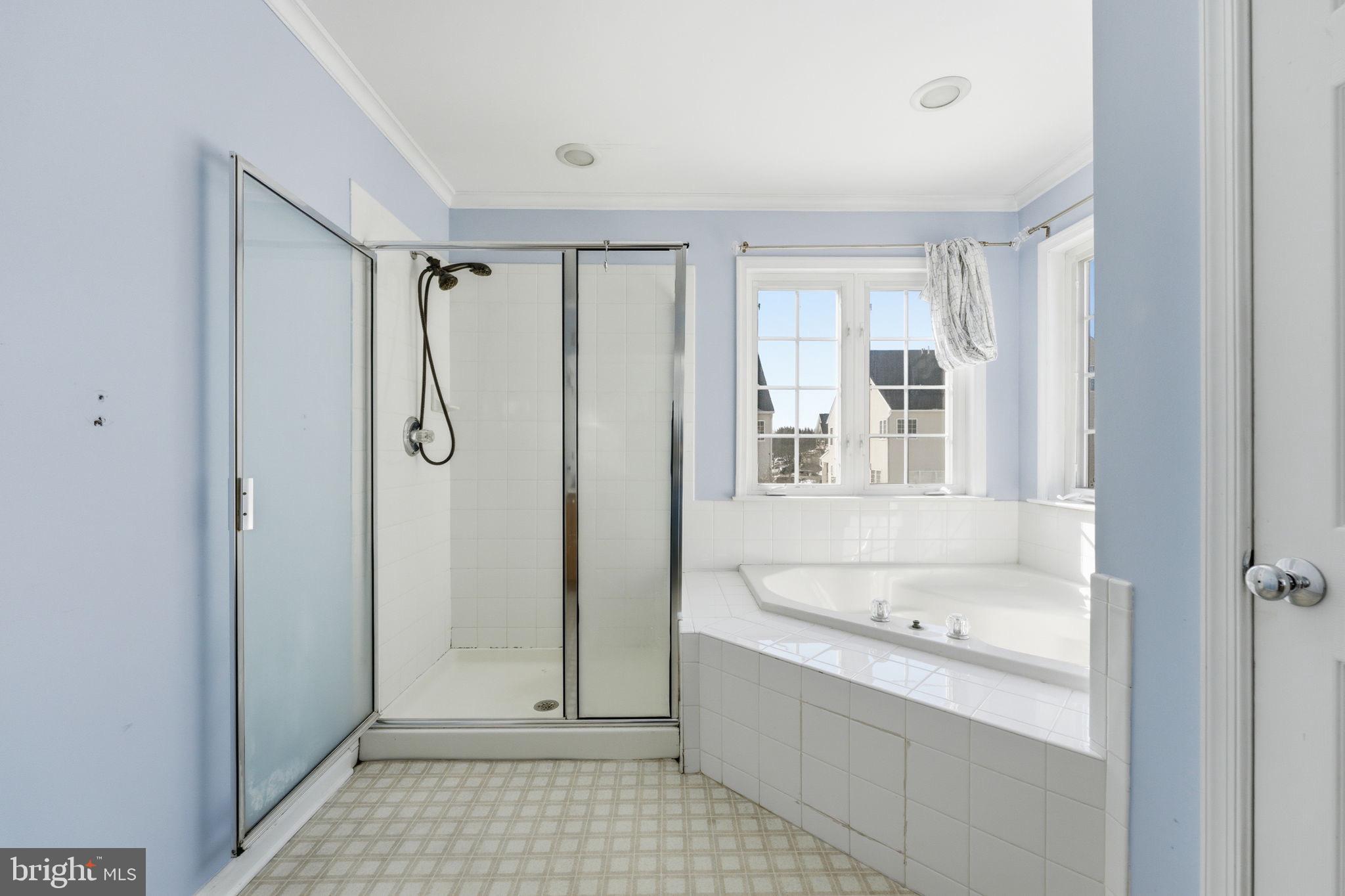 187 Gillespie Avenue Middletown, DE 19709 - Photo 32 of 43 a bathroom with a tub sink and shower