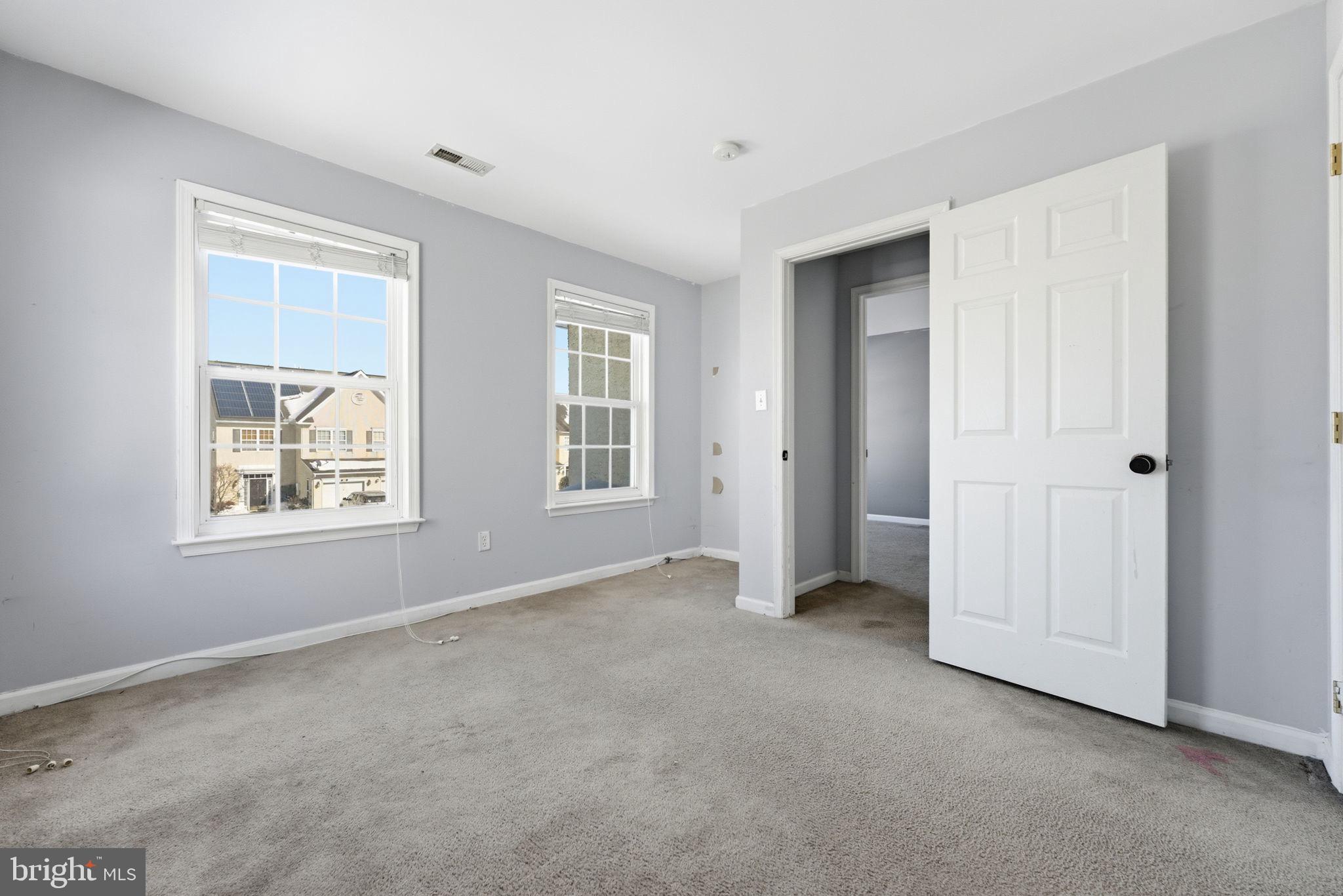 187 Gillespie Avenue Middletown, DE 19709 - Photo 40 of 43 an empty room with windows