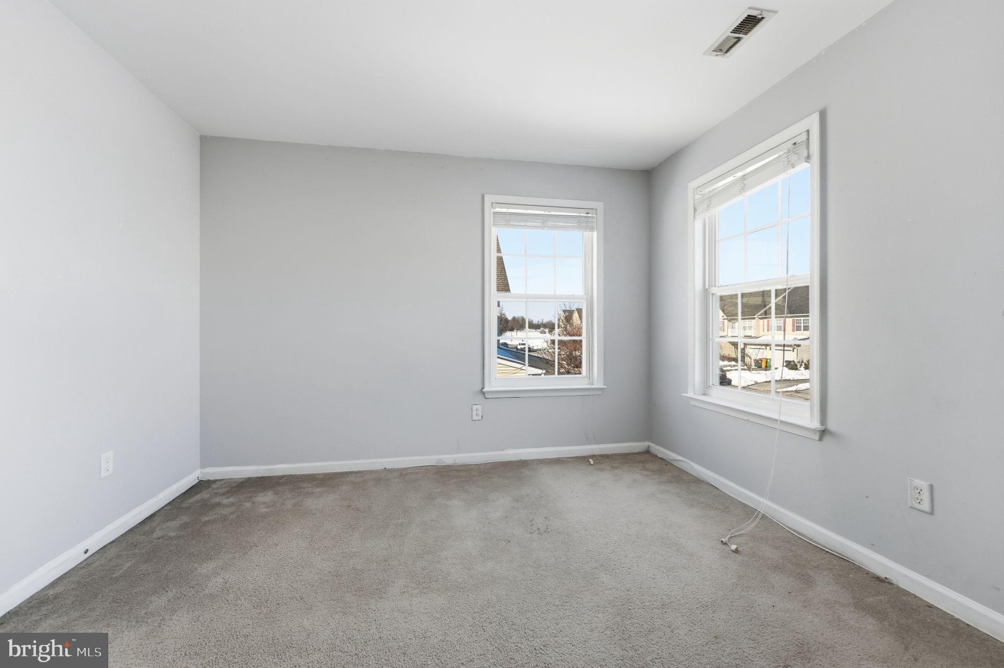 187 Gillespie Avenue Middletown, DE 19709 - Photo 42 of 43 an empty room with windows