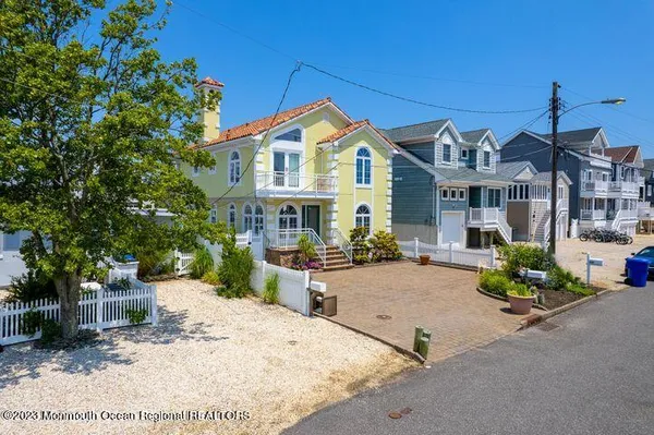 a front view of a house with a patio