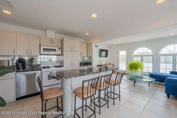 a view of a dining room kitchen and a window