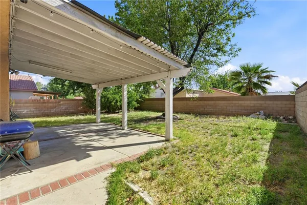 a view of backyard with green space