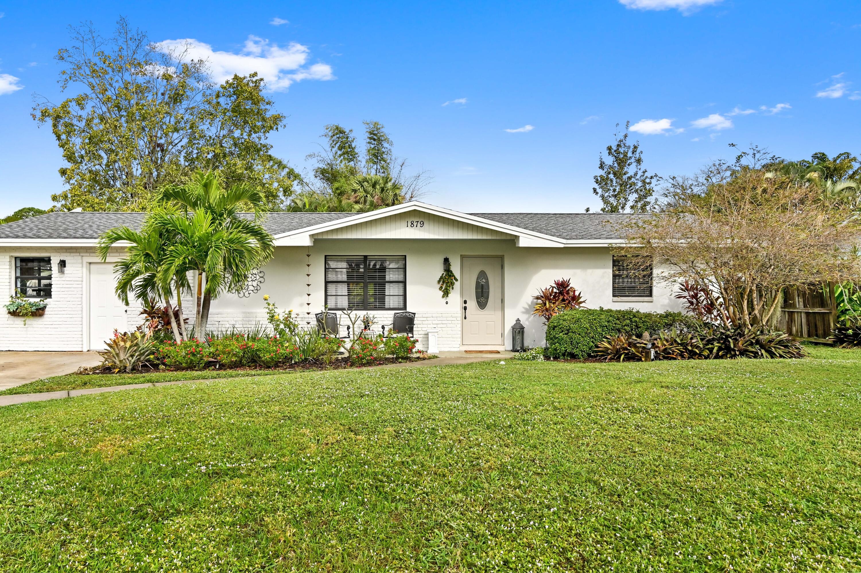 1879 Northwest Azalea Street Stuart, FL 34994 - Photo 1 of 35 02 front 03