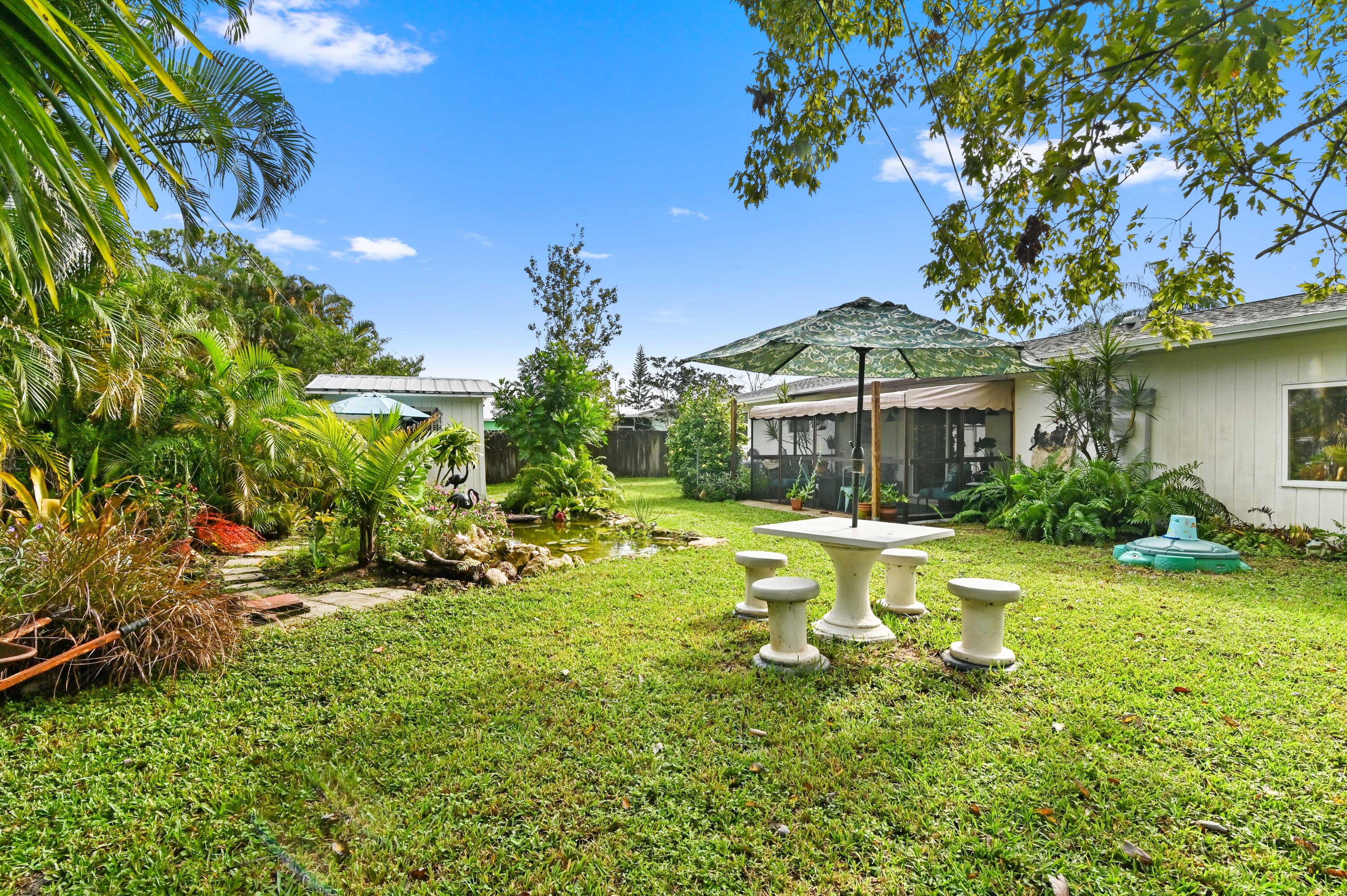1879 Northwest Azalea Street Stuart, FL 34994 - Photo 25 of 35 25 Patio 04
