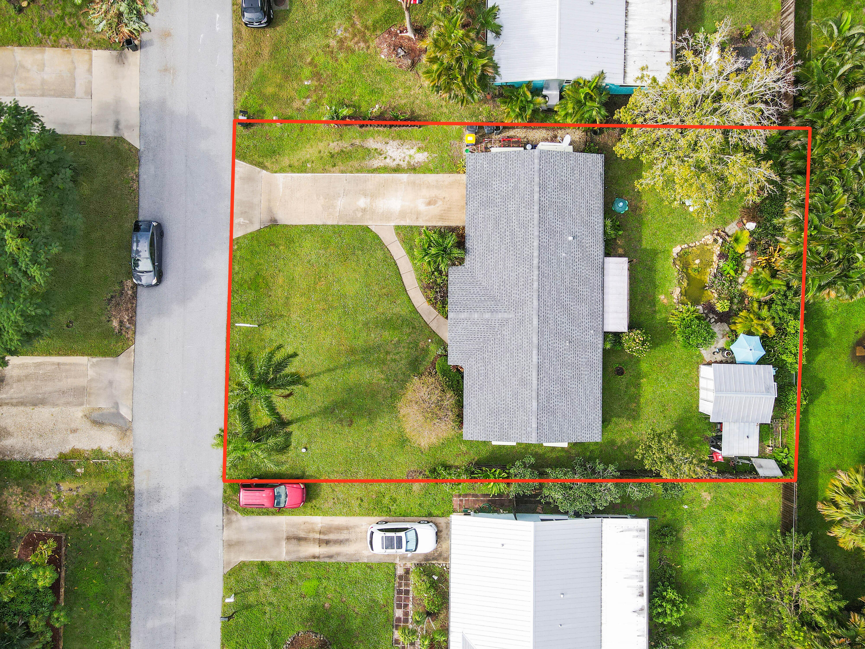 1879 Northwest Azalea Street Stuart, FL 34994 - Photo 3 of 35 34 drone 07